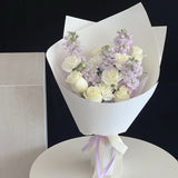 Carnegie Florist in Melbourne white roses+ white carnations + stock flowers bouquet
