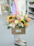 Carnegie florist basket flower arrangement