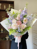 Designer Carnegie Florist in Melbourne pink or peach roses+ other flowers bouquet