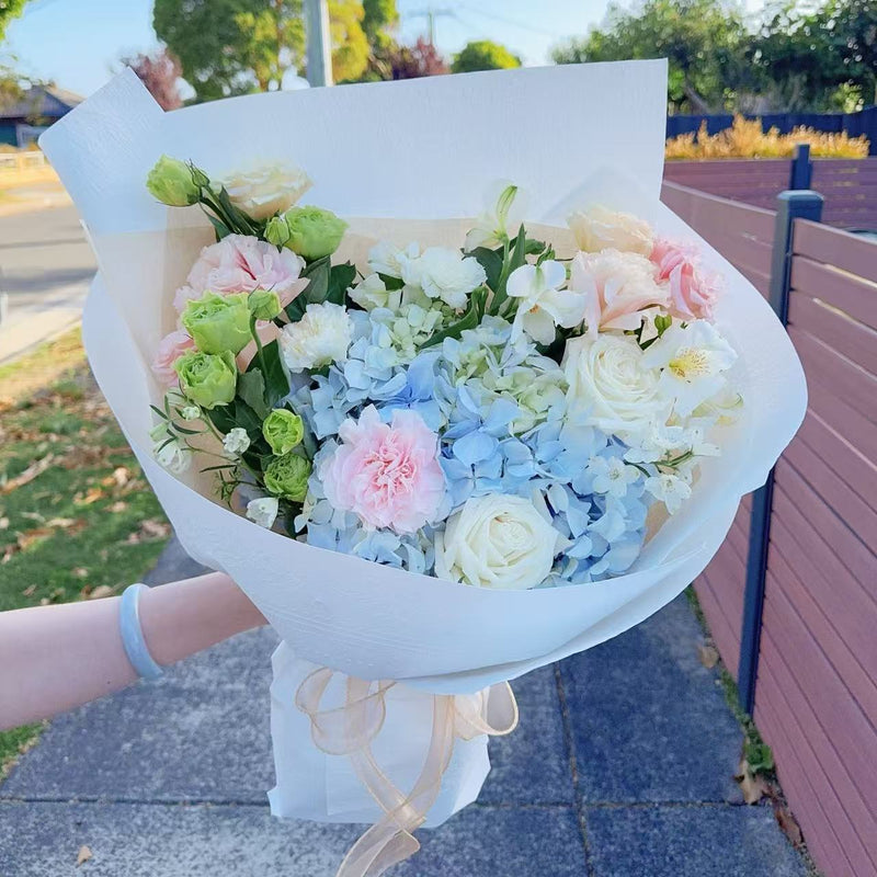Carnegie Florist in Melbourne blue+ white +pinkflowers bouquet